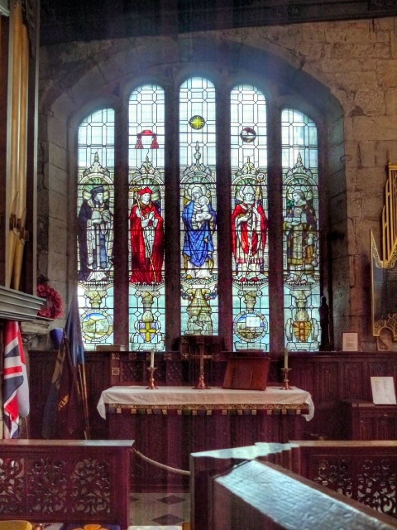 Langley is one of the figures depicted in the chapel’s stained glass window (second from the left), photo by David Dixon, Geograph (CC BY-SA 2.0)